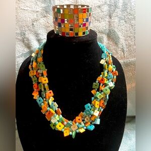 Source unknown on brand, bracelet is a 3 stretch blocked color that is fabulous